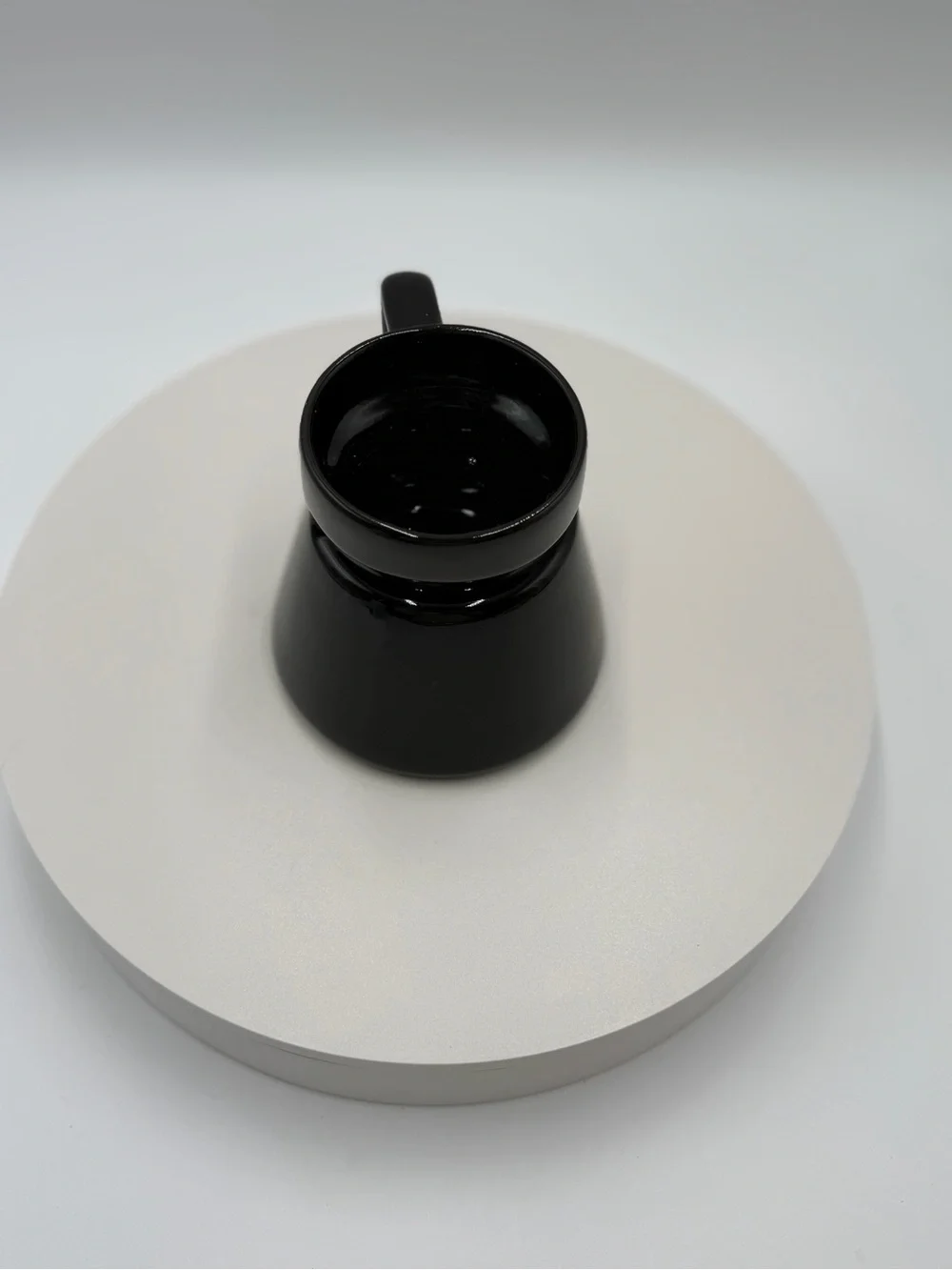 Eddie Bauer Glossy Black Sculpted Ceramic Mug